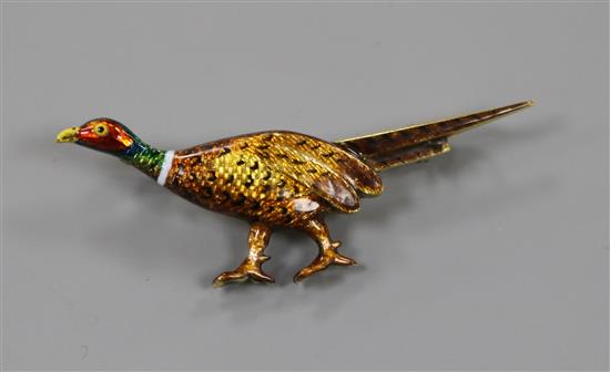 A yellow metal and polychrome enamel pheasant brooch, 48mm.